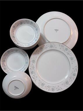 White Porcelain Dinnerware Set with Pale Blue and Pink Floral Border
